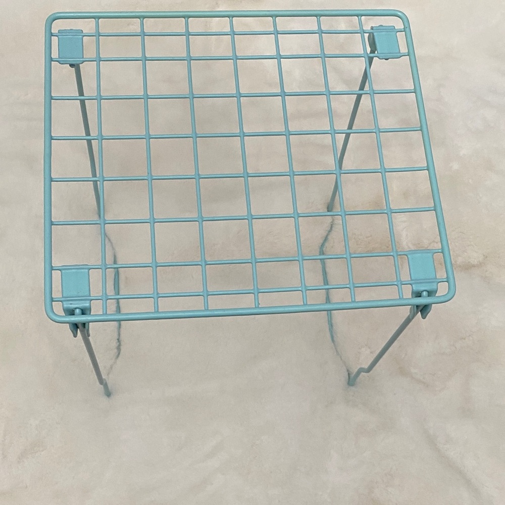 Aqua Metal Grid Locker Shelf. Folds Up For Storage